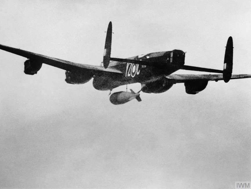 A Lancaster B Mark I (Special) of 617 Squadron releases its 22,000 lb 'Grand Slam' deep penetration bomb over the Arnsberg viaduct in Germany. Arnsberg lay in the eastern Ruhr Valley, not far from the Mohne dam.jpg