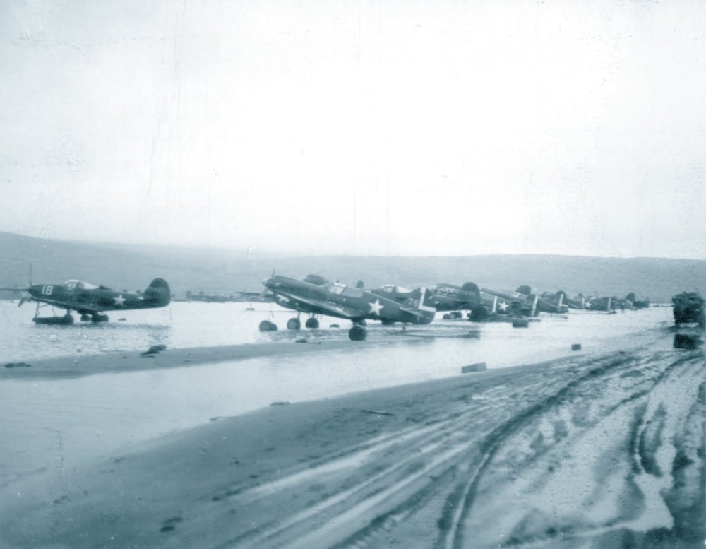 Curtiss-P-40E-Warhawk-343FG11FS-Aleutian-Tigers-Yellow-76-after-heavy-rains-at-Longview-Adak-Island-7th-Aug-1942-NA1120.thumb.jpeg.3aa85fb9d00873c074659023752c981c.jpeg