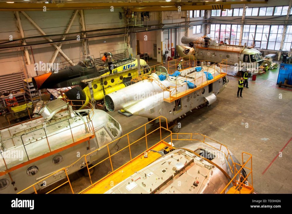 tyumen-russia-june-5-2019-aircraft-repair-helicopter-utair-engineering-plant-mi-8-helicopter-during-maintencance-and-repair-at-the-service-hanga-TD3HGN.jpeg