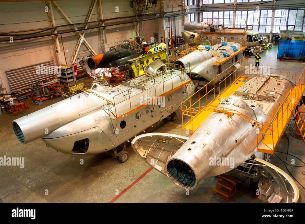 tyumen-russia-june-5-2019-aircraft-repair-helicopter-utair-engineering-plant-mi-8-helicopter-during-maintencance-and-repair-at-the-service-hanga-TD3HGP.jpeg